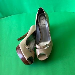 GUESS Platforms Women’s. Peep toe. Cream colored platforms with 5” heel.